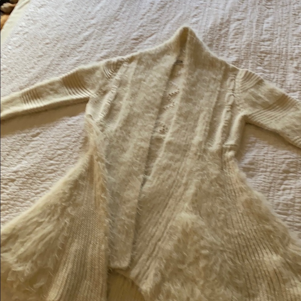 Molly Bracken above knee, long sleeve sweater